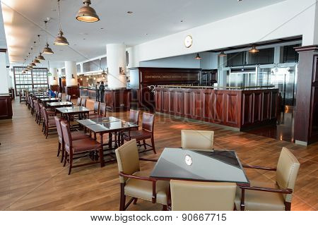 DUBAI, UAE - MARCH 10, 2015: DXB airport interior. Dubai International Airport is the primary airport serving Dubai, and is the world's busiest airport by international passenger traffic.