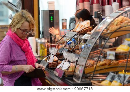DUBAI, UAE - MARCH 10, 2015: DXB airport interior. Dubai International Airport is the primary airport serving Dubai, and is the world's busiest airport by international passenger traffic.