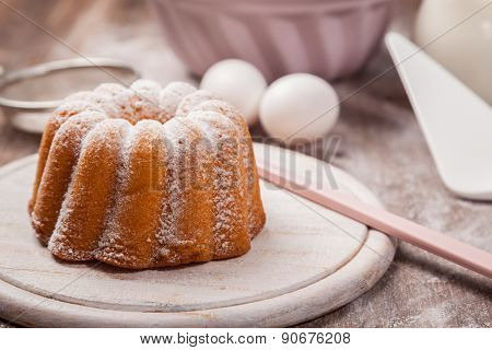 Homemade marble cake on wooden table