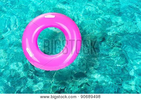 Lifebuoy on water background