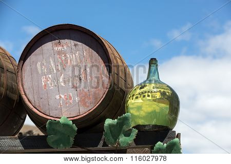 Lanzarote.spain. - September 9, 2015: Barrels And Big Bottles With Grape Wine - Malvasia. Lanzarote 