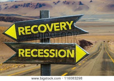 Recovery - Recession signpost in a desert background