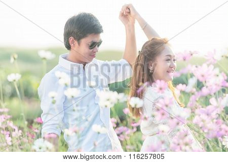 Happy Young Couple In Love Outdoor In Spring