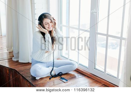 woman listening music with headphones. relax and unwind