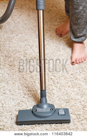 Woman Cleaning carpet