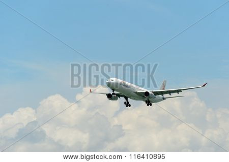 HONG KONG - JUNE 04, 2015: Dragonair aircraft landing at Hong Kong airport. Dragonair is a Hong Kong-based international regional airline