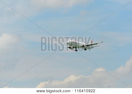 HONG KONG - JUNE 04, 2015: Dragonair aircraft landing at Hong Kong airport. Dragonair is a Hong Kong-based international regional airline
