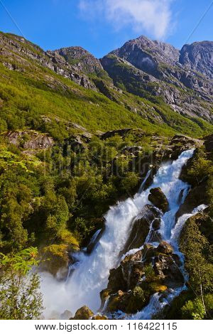 Waterfall near Briksdal glacier - Norway - nature and travel background