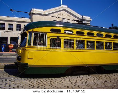 Yellow Tram At Pier 15 In San Francisco, California Usa
