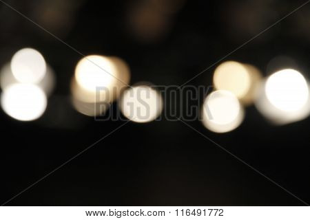 Fractured pin points of bright light forming bokeh.