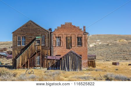 Wooden And Brick Building In Bodie