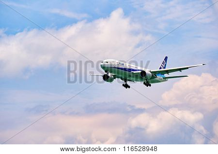 HONG KONG - JUNE 04, 2015: All Nippon Airways aircraft landing at Hong Kong airport. All Nippon Airways Co., Ltd., also known as ANA, is the largest airline in Japan