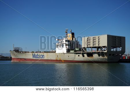 Matson Shipping Boat Is Unloaded By Cranes In Oakland Harbor