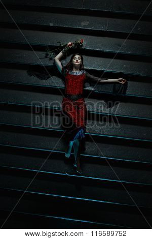 Terrible Tale Of A Girl Lying On The Stairs.