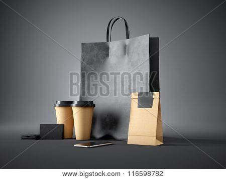 Set of black shopping bag, coffee cups, paper package, blank business cards and generic design smart