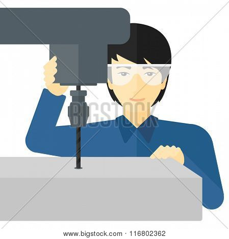 Man working with boring mill.