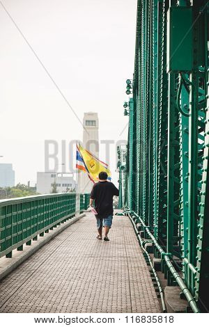 One Man Walk On Walking Way Beside Memorial Bridge