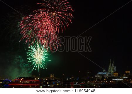 Colourful firework in front of the cathedral of Cologne Germany