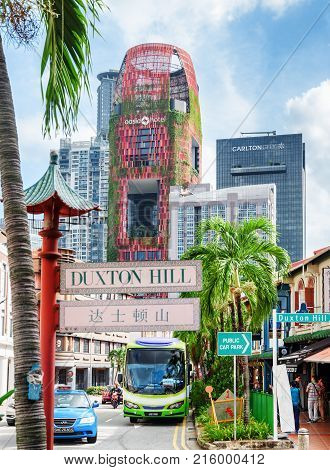 Colonial Buildings At Duxton Hill And Skyscrapers Of Downtown