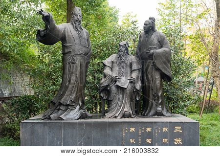 Chengdu, China - Nov 28, 2017: BaoZhao chniese SuChe, SuXun and SuShi poets statues in HuanHuaXi public park.
