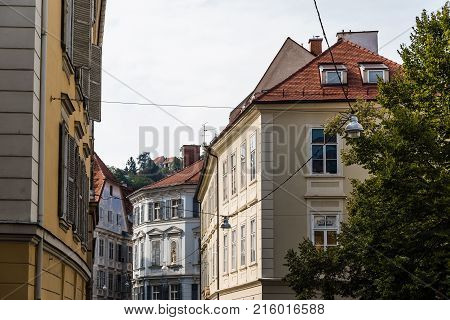 Graz, Austria - August 11, 2017: Low angle view of old buildings in historical city center of Graz