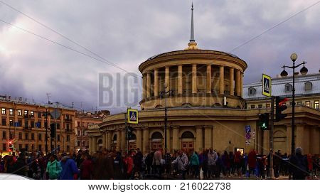 Metro station "Ploshchad Vosstaniya" and a pedestrian crossing through Ligovsky Prospect in St. Petersburg (Russia) with pedestrians passing by
