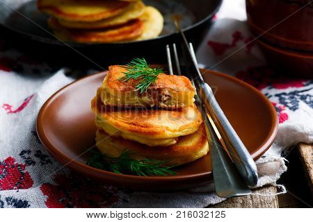 Pancakes with force meat. style rustic.selective focus