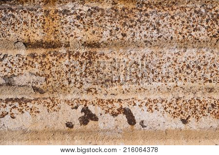 Background of rusty metal with irradiated paint