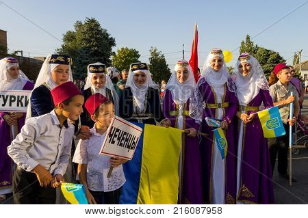Genichesk, Ukraine - August 26, 2017: Undefined people in a traditional clothing during Festival of National Cultures Tavriyska rodyna (Tavria Family)