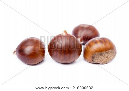 Tasty ripe chestnuts isolated on a white background