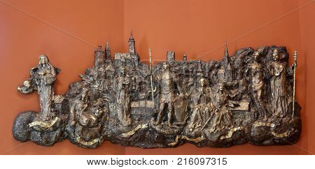 ZAGREB, CROATIA - MARCH 31: Bas relief with churches and patron saints of Gradec, the old part of Zagreb in Chapel of Saint Dismas in Zagreb, Croatia on March 31, 2015