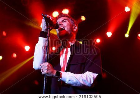 HUNTINGTON, NY-OCT 31: Singer Nick Hexum of 311 performs onstage at the Paramount on October 31, 2017 in Huntington, New York.