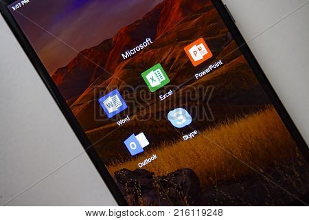 Berlin Germany - November 19 2017: Microsoft apps on screen modern smartphone. Word Exel PowerPoint Outlook Skype application icon on display. Microsoft office.