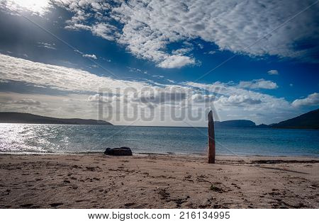 Beach In A Sunny And Cloudy Day