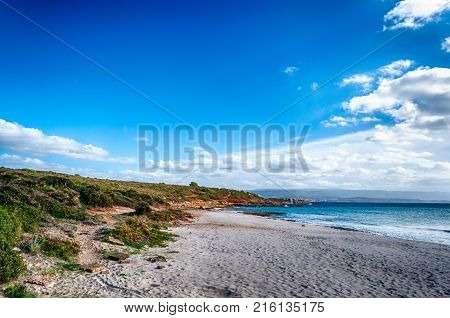 Beach In A Sunny And Cloudy Day