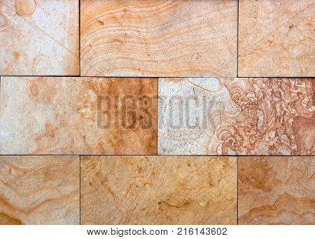 Stone wall texture, travertine tiles facing background