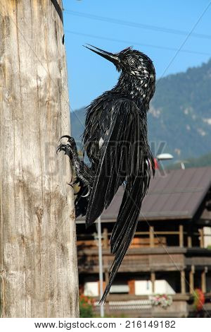 Italy Rocca Pietore - August 26 2016: the view of the decorative ironwork sculpture butterflies on a wall on August 26 2016 Veneto Italy.