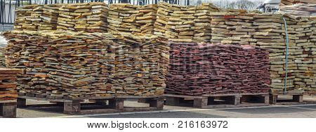 decorative building stone on a pallet can be used for advertising.