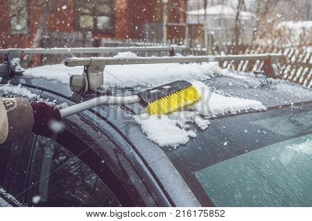 Car on empty snowy road. Travelling concept.