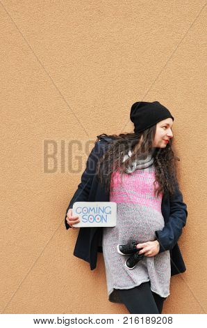 Pregnant woman. Pregnancy. A photo of a cute caucasian pregnant woman.