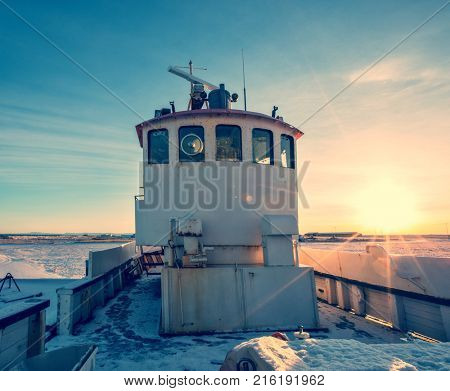 Old fisherman iron boat in Iceland, grunge colored design