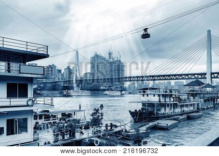 andscape of downtown near water of chongqing in blue sky