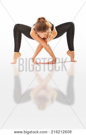 Beautiful Flexible Woman Doing Yoga Poses On White