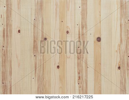 Light yellow wood background. Rought cut pine board texture.