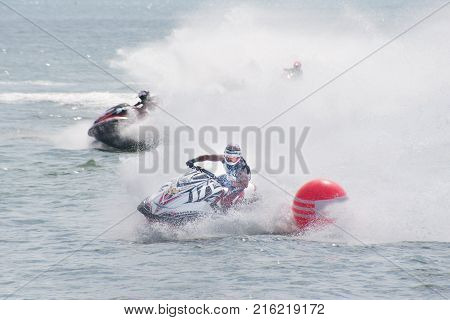 CHONBURI ,THAILAND - DECEMBER 6,2015 : Unidentified riders from all over the World in jet Ski racing came to King's Cup jet Ski World Cup 2015 Competition at Jomtien beach, Pattaya in Chonburi Province , Middle of Thailand.