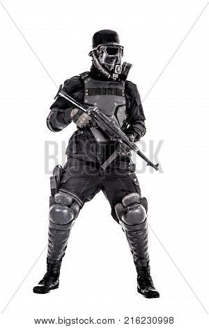 Futuristic nazi soldier gas mask and steel helmet with schmeisser handgun isolated on white studio shot full body portrait