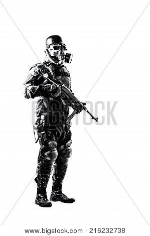 Futuristic nazi soldier gas mask and steel helmet with schmeisser handgun isolated on white studio shot full body portrait