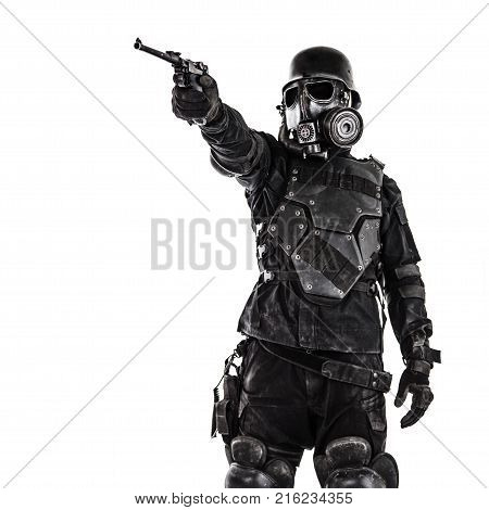 Futuristic nazi soldier gas mask and steel helmet with luger pistol handgun isolated on white studio shot