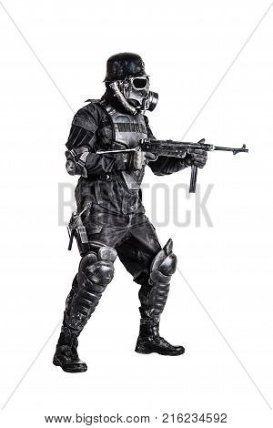Futuristic nazi soldier gas mask and steel helmet with schmeisser handgun isolated on white studio shot full body portrait