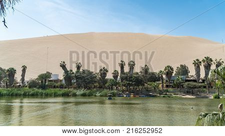 Huacachina Peru - August 2017: Oasis of Huacachina and the desert in Ica region Peru.